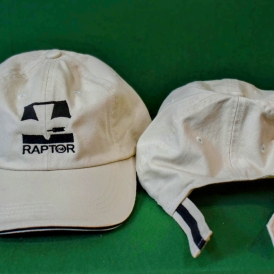 Tan hat with black Raptor Logo front and back